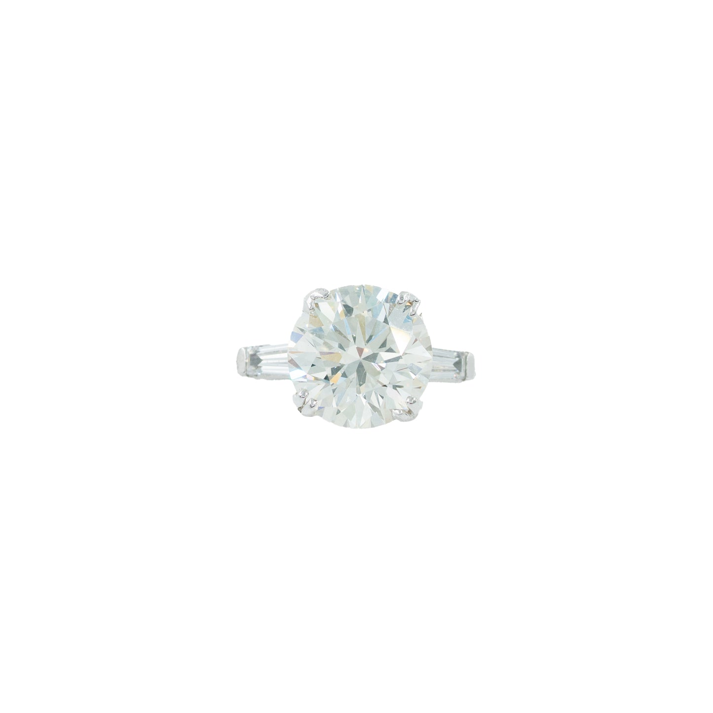 Solitaire diamond ring on a white background