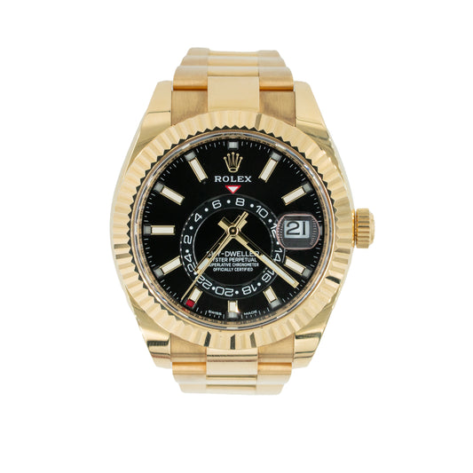 Rolex Gold watch with black dial on a white background