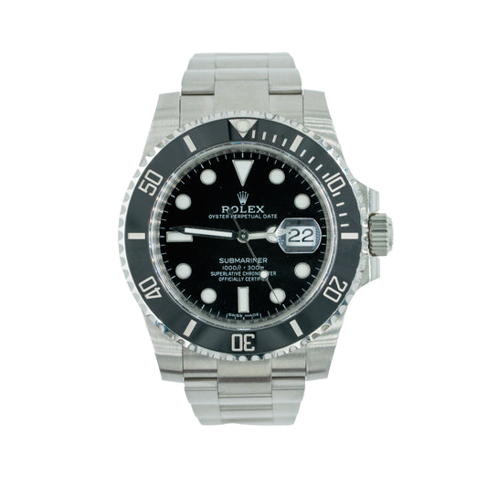 Rolex Submariner watch with black dial and silver metal bracelet on a white background